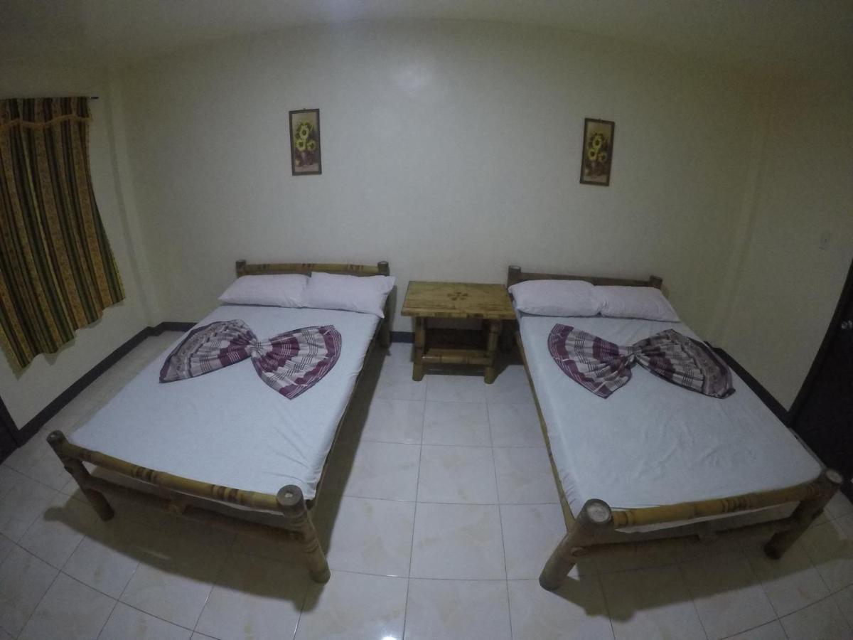 Se San Beach Resort-Isla De Gigantes Carles Εξωτερικό φωτογραφία