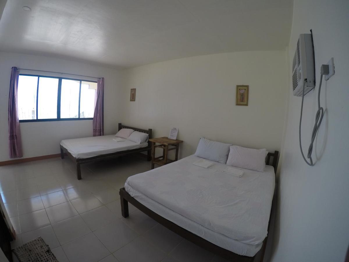 Se San Beach Resort-Isla De Gigantes Carles Εξωτερικό φωτογραφία